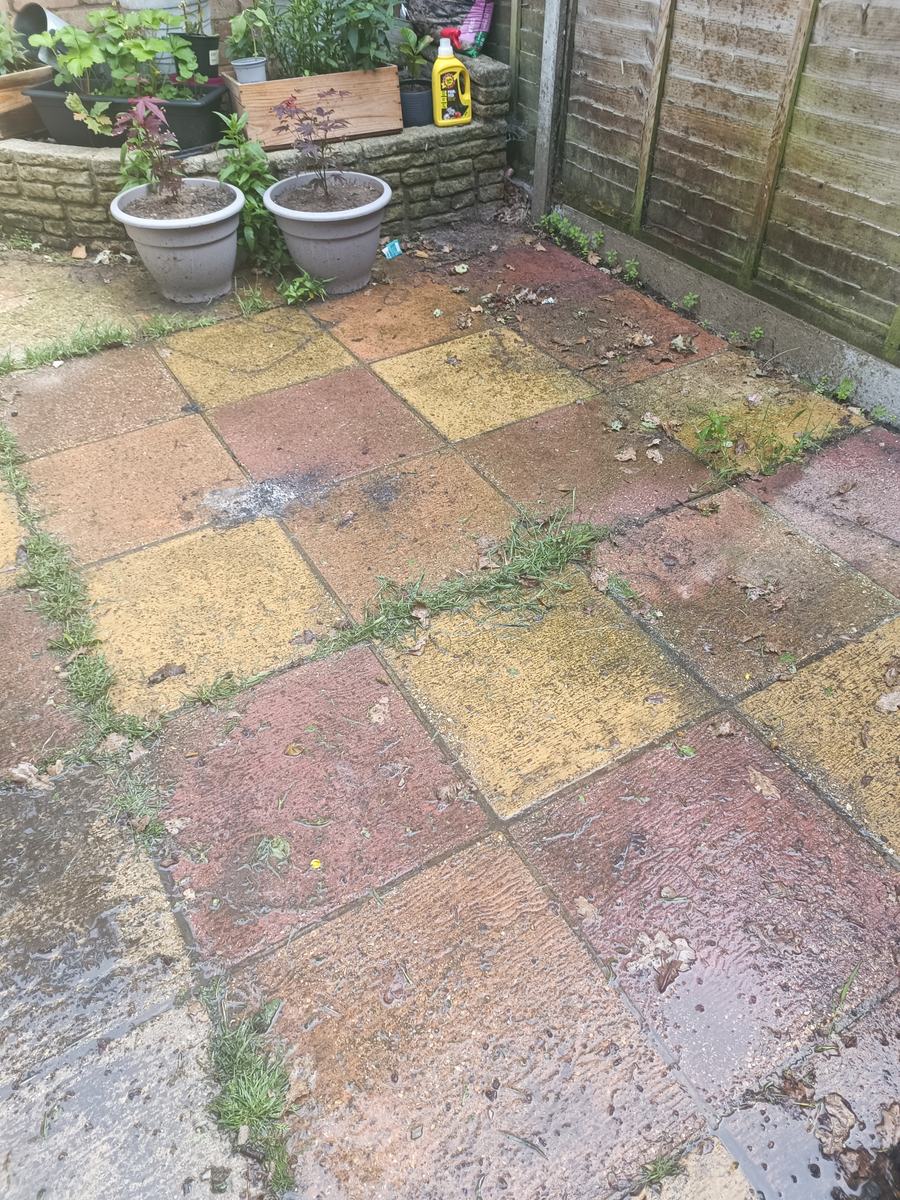 Patio cleaning, coloured slabs, before